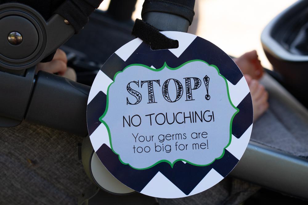 Newborn baby boy seahawk car seat sign to not touch baby stroller