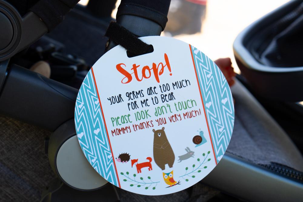 Newborn baby boy woodlands car seat sign to not touch baby stroller